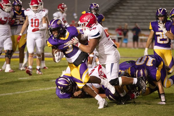 Lemoore's Kobe Green stole the football and ran it all the way four a Lemoore touchdown. 